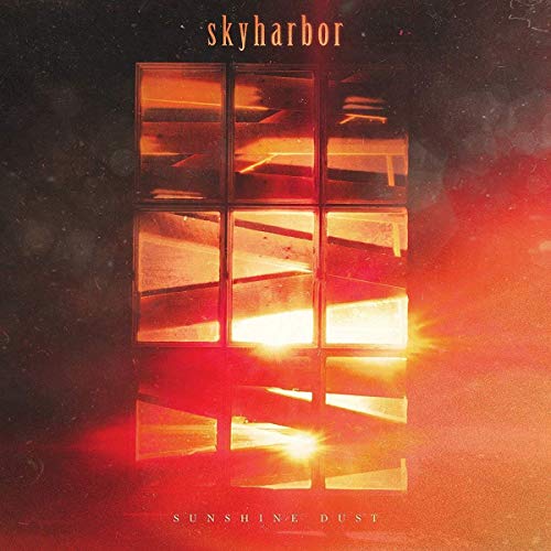 Album cover featuring a grid of glowing, orange-lit windows against a dark, textured background.