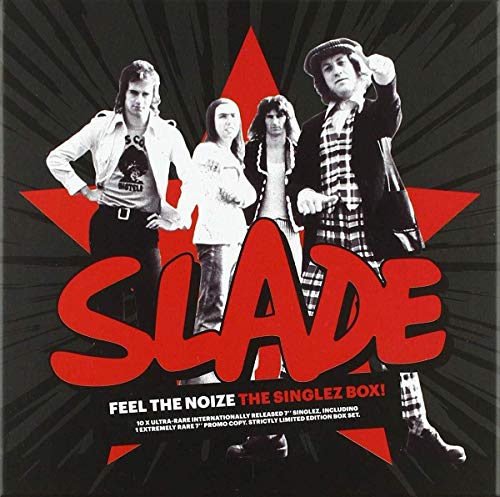 "Album cover with band Slade standing in front of a red star on a black background."