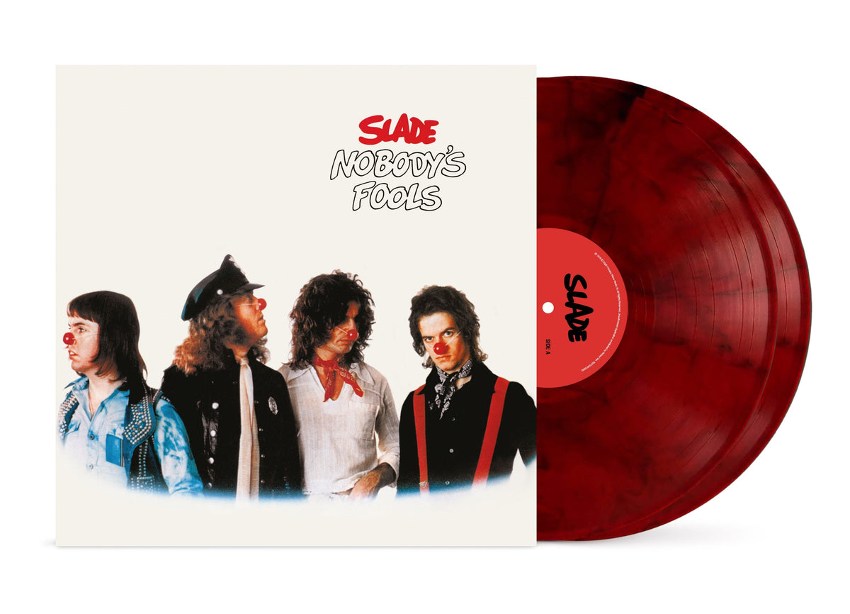 Slade’s “Nobody’s Fools” vinyl record with band photo and red swirl disc.