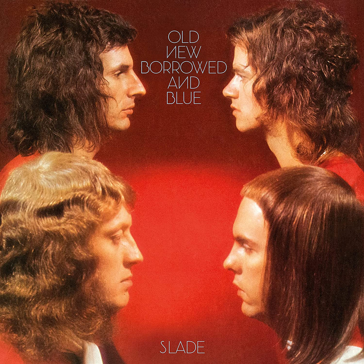 "CD album cover featuring Slade band members in a red background."