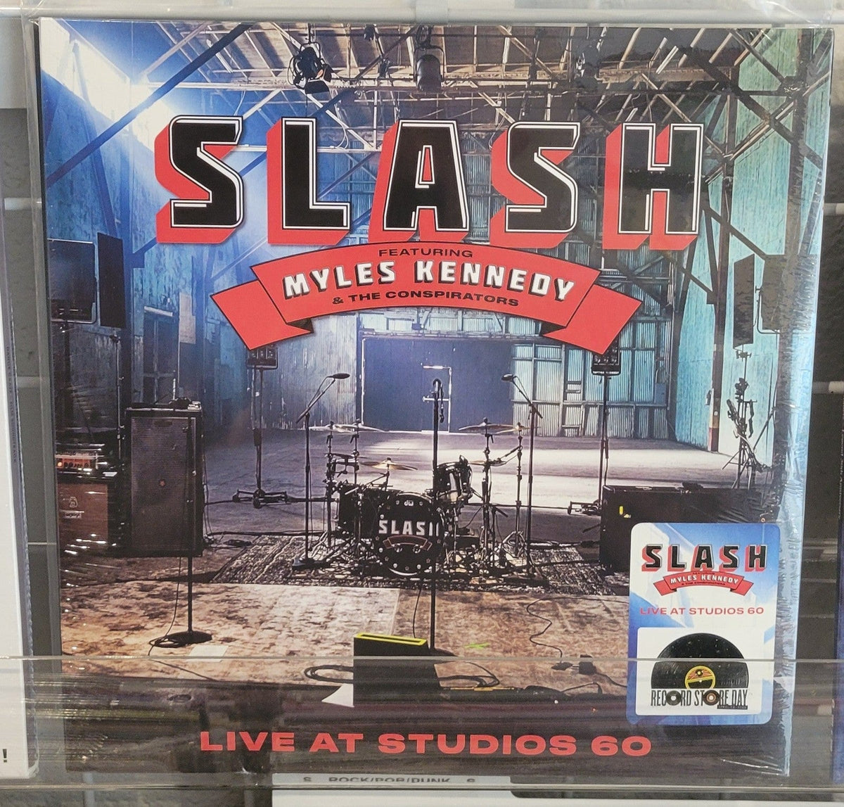 Vinyl record cover for Slash featuring Myles Kennedy & The Conspirators live album.