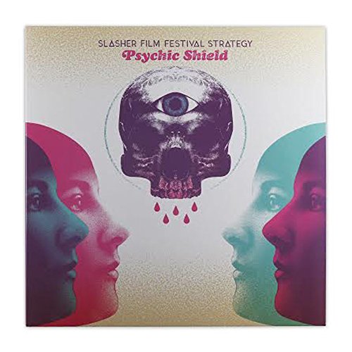 Vinyl record cover with a skull-eye design and flanking faces.
