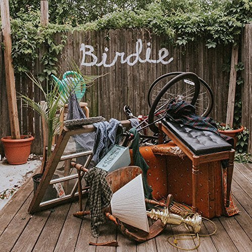 CD cover with "Birdie" text over a cluttered backyard scene.