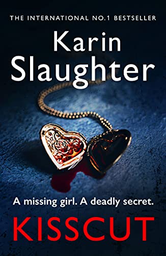 Book cover: "Kisscut" by Karin Slaughter, featuring a heart-shaped locket.