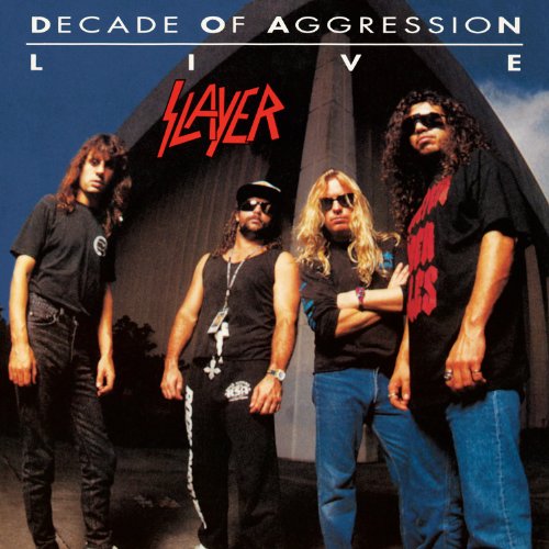 Slayer band members posing in front of a dark, triangular backdrop.