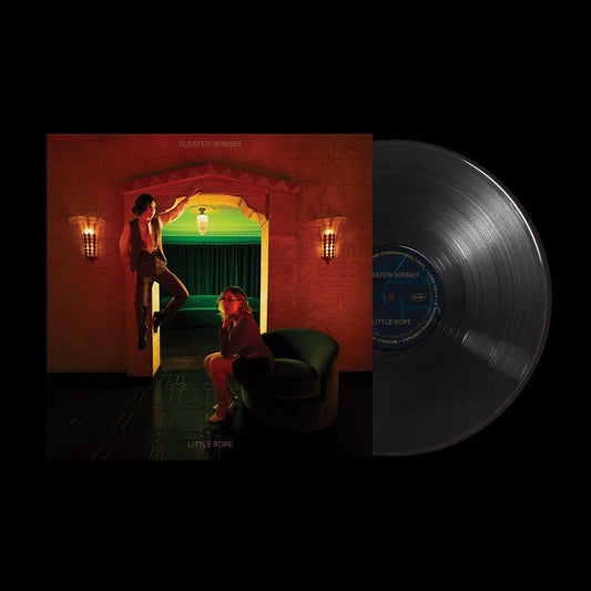 Sleater-Kinney Little Rope album cover art with a vinyl record on a black background.