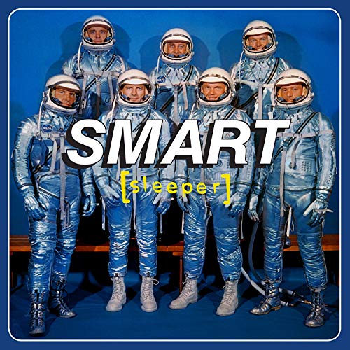 Eight astronauts in blue suits with "SMART" and "sleeper" text.