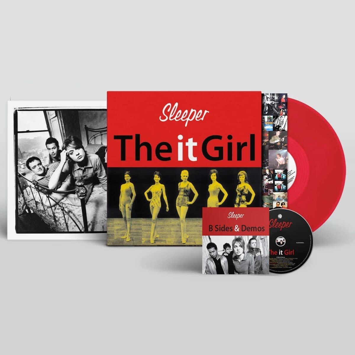 "Red vinyl record with album cover featuring black and white and yellow images."