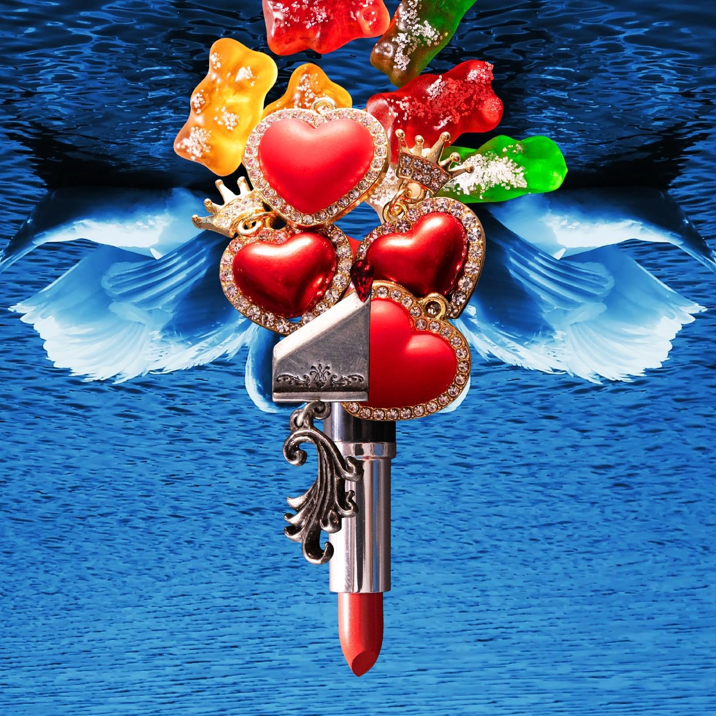 CD cover with lipstick, gummy candies, hearts, and wings on blue.