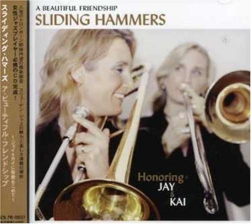 Two women playing trombones on the cover of the Sliding Hammers music CD.