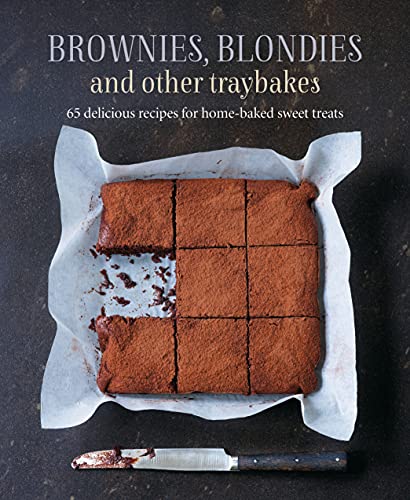 Cookbook cover featuring a tray of cut brownies on parchment paper.