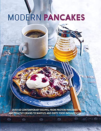 Cookbook cover featuring pancakes with berries and cream, coffee, and a honey jar.