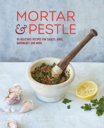 Cookbook cover featuring a mortar and pestle with green sauce, garlic, and lemon.