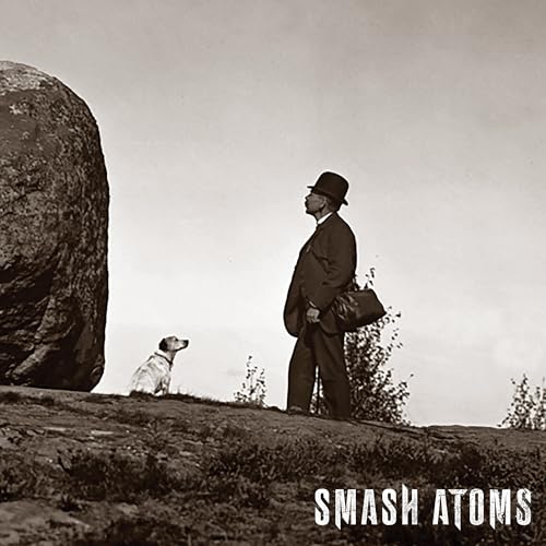 Man in suit and dog beside a large rock, album cover.