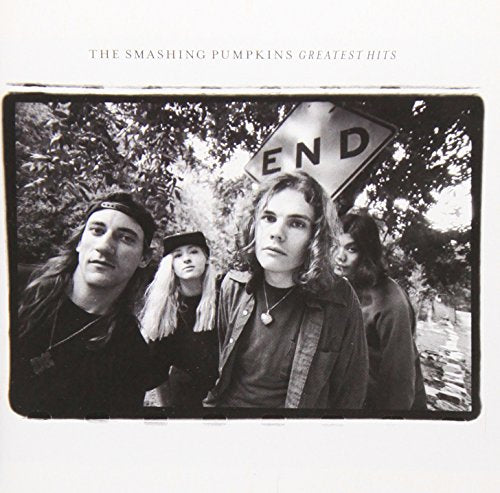 Black and white album cover of The Smashing Pumpkins with band members.