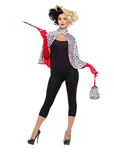 Woman wearing a dalmatian print cape, red gloves, black outfit, and half-black half-white wig.