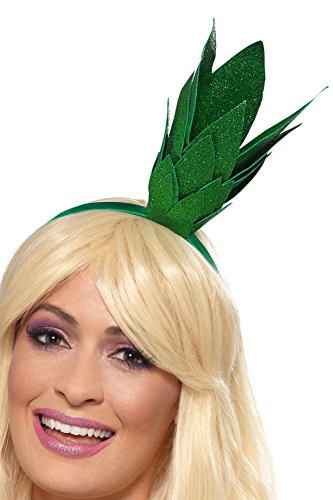 Green glitter pineapple stalk headband worn on blonde hair.
