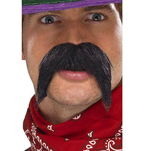 A man wears a fake black mustache, red bandana, and a green and purple hat.