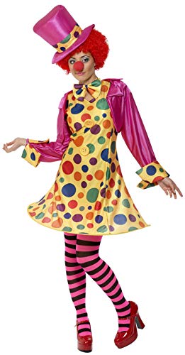 Woman in a colorful clown costume with red wig and polka dot dress.