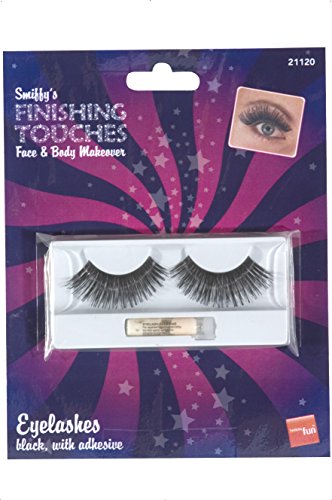 A pair of black false eyelashes and adhesive in packaging with a star background.