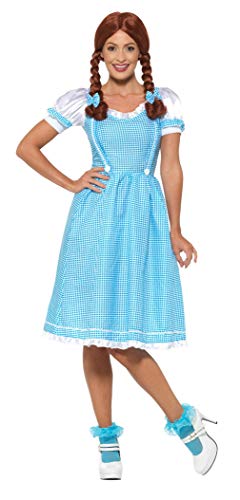 Woman in a light blue gingham dress with braided red hair.