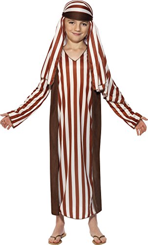 A young child wearing a striped shepherd costume with a headscarf and sandals.