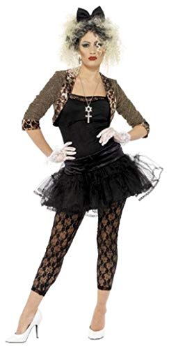 Woman in 1980s-style black and gold costume with large bow and tulle skirt.