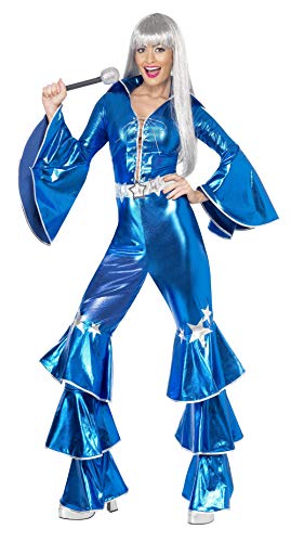 Woman in a shiny blue 1970s-style jumpsuit and silver wig.