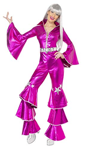 A woman wears a shiny pink 1970s-style disco jumpsuit with flared sleeves and legs.