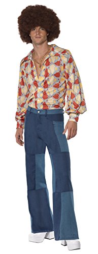 Man wearing 1970s retro costume, including patterned shirt, patchwork jeans, wig, and white shoes.