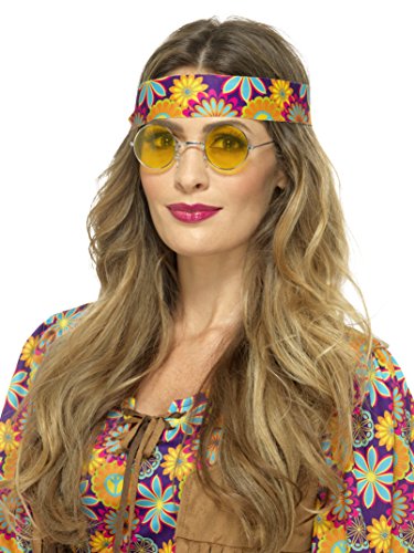The image shows a woman wearing yellow round sunglasses and a floral headband. For accessibility purposes, a concise alt text could be: "Woman wearing yellow sunglasses and a purple floral headband."