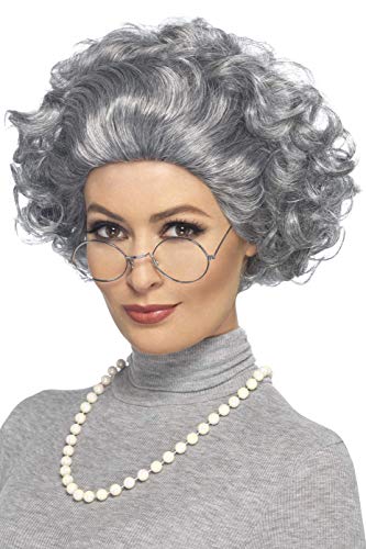 Woman wearing a grey curly wig, glasses, and pearl necklace.