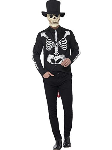 Man dressed in black skeleton costume with top hat, standing with hands in pockets.