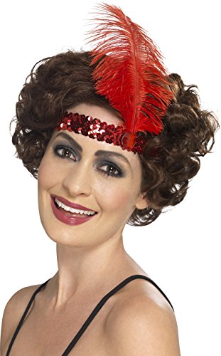 Woman wearing a red feathered headband with sequins and curly brown hair.
