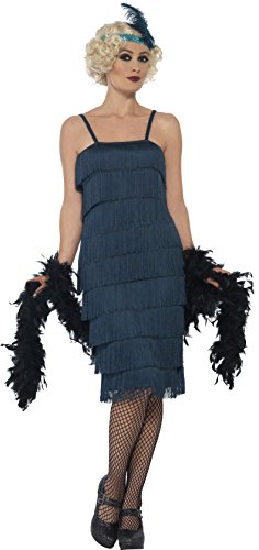Woman wearing a green, fringed 1920s flapper dress with feather boa.