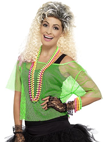 Woman wearing a green fishnet top, black skirt, and colorful beaded jewelry, posing confidently.
