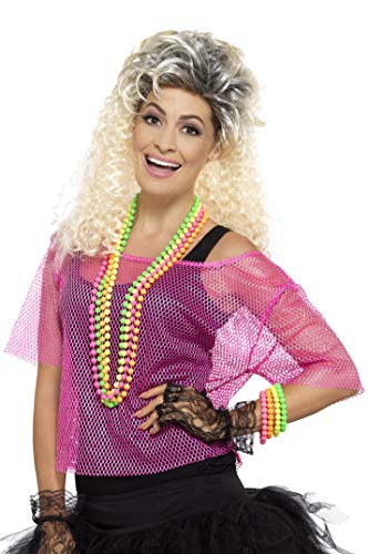 Woman wearing a neon pink fishnet top and 80s accessories.