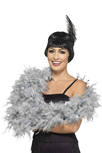 Woman wearing a fluffy silver feather boa and flapper-style headband.