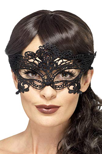 Black lace eye mask with filigree heart shapes, worn on a model.