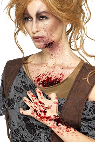 Woman with realistic fake blood and scab special effects makeup.