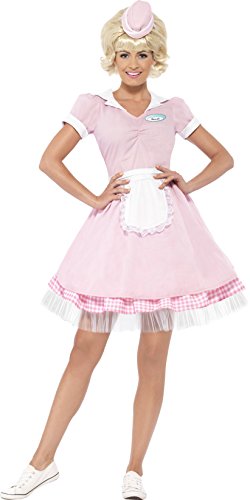 Woman wearing a pink 1950s diner girl costume, apron, and blonde wig.