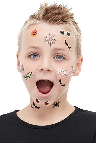 Child with Halloween temporary tattoos on face and neck.