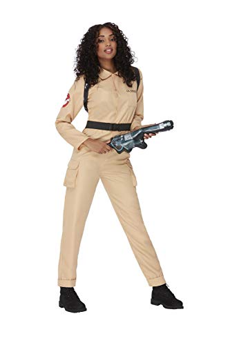 Woman in a beige Ghostbusters jumpsuit holding a proton pack and blaster.