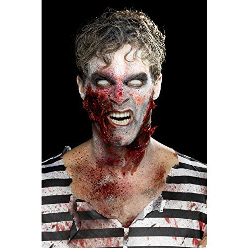 Man with zombie makeup, pale skin, white eyes, and red blood splatters.