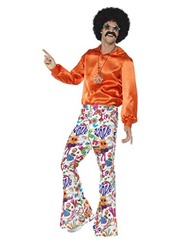 Man wearing colorful, flared 1960s style trousers and orange shirt.