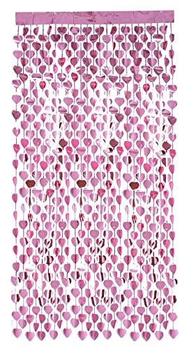 A pink foil curtain backdrop made of many small hanging heart shapes.