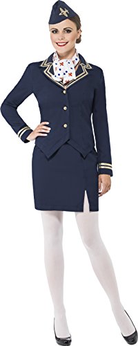 "Woman wearing navy blue airline uniform with white scarf and hat, standing confidently."