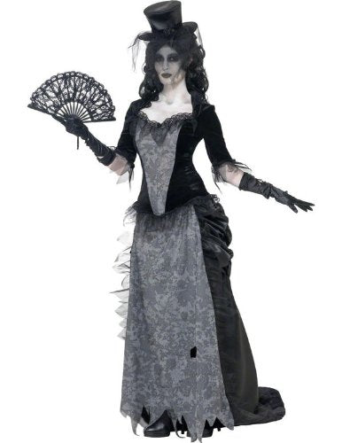 Woman in a black and gray Victorian-style costume, holding a black lace fan, with pale face makeup.