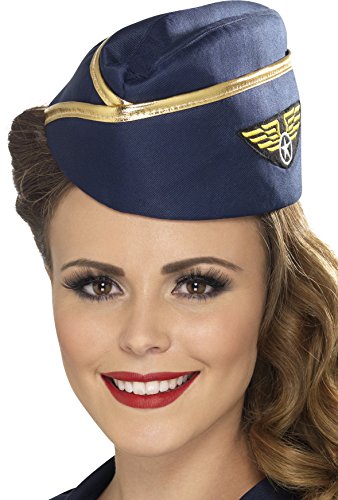 "Blue air hostess hat with gold trim and wing emblem on a woman's head."