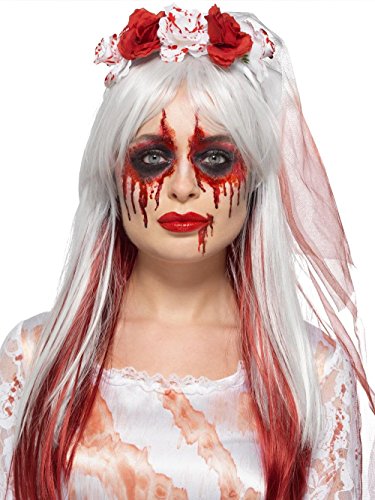 "Halloween makeup kit packaging featuring a woman with blood-stained face and white hair."